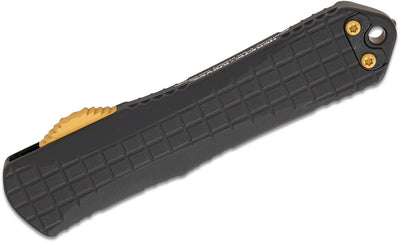 Black grenade grip handle of Heretic Knives Manticore E OTF AUTO Knife with gold accents.