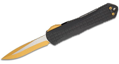 Heretic Knives Manticore E OTF AUTO Knife with 3.05" two-tone gold blade and black aluminum grip.