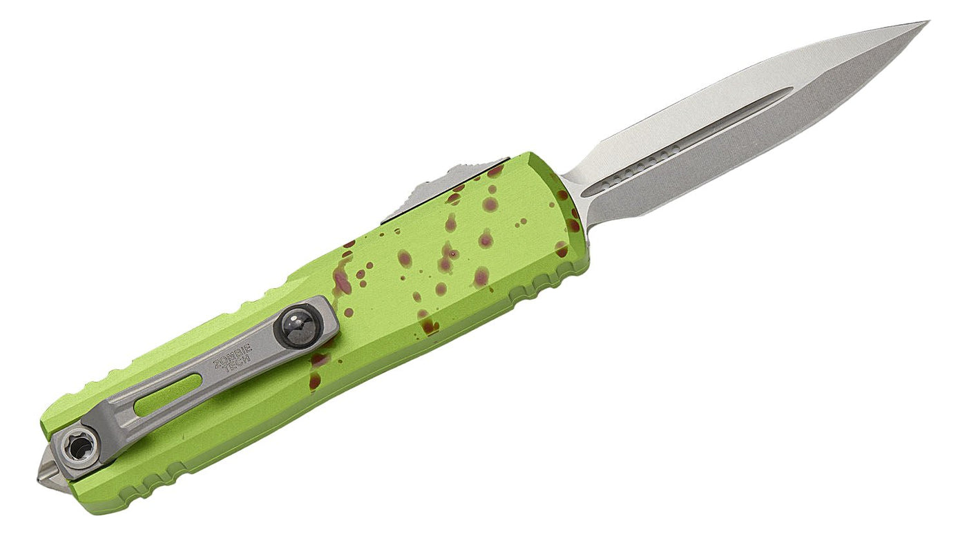 Microtech 12324 - 10Z Zombie Tech UTX - 85 Gen IV OTF AUTO Folding Knife - 3" M390MK Stonewashed Double Edge Dagger Blade, Zombie Green Machined Aluminum Handles - timberknives.com