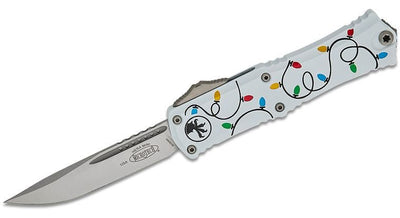 Microtech 1703M - 10WHCMAS Signature Series Hera II Mini OTF AUTO Knife 3" M390MK Stonewashed Drop Point Plain Blade, Christmas White Deep Engraved Aluminum Handles - timberknives.com