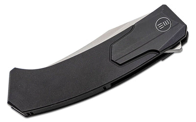We Knife Rafal Brzeski Shuddan Flipper Knife 3.48" CPM - 20CV Satin Trailing Point Bowie Blade, Black Titanium Handles, Frame Lock - WE21015 - 1 - timberknives.com